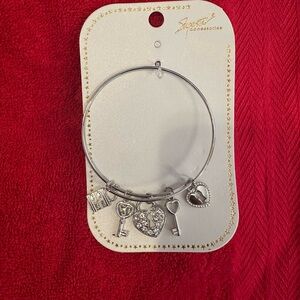 Elegant Silver Charm Bracelet with Heart and Key Accents